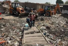 AMC Launches Major Demolition Drive At Isanpur Lake; Over 20 JCBs Deployed After Chandola Operation