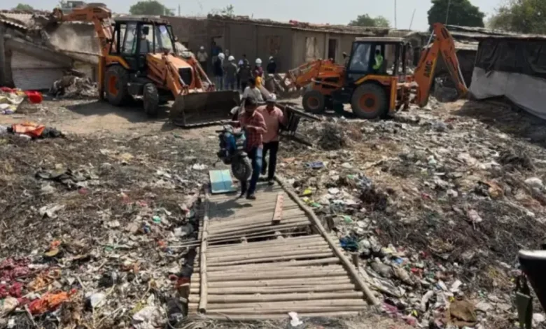 AMC Launches Major Demolition Drive At Isanpur Lake; Over 20 JCBs Deployed After Chandola Operation