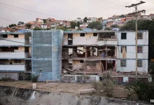 A damaged building following US strikes on Venezuela.
