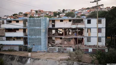 A damaged building following US strikes on Venezuela.