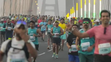 Runners participating in TATA Mumbai Marathon 2026 at Marine Drive
