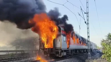 Flames and smoke billow after a fire broke out in an AC coach of the Thiruvananthapuram-Hazrat Nizamuddin Rajdhani Express i