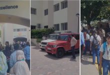 "Police and bomb squad teams at an Ahmedabad school following a bomb threat email"