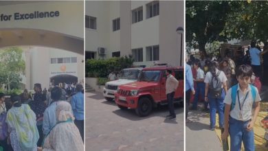 "Police and bomb squad teams at an Ahmedabad school following a bomb threat email"