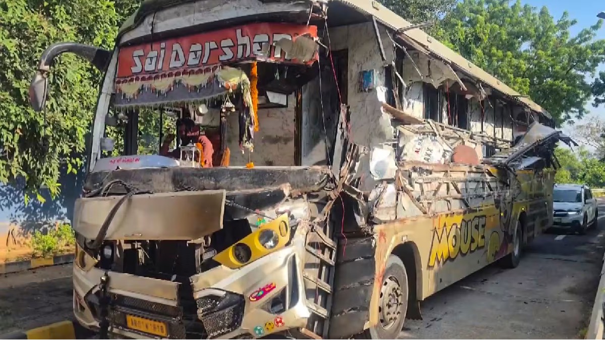 Damaged luxury bus and truck on the Vadodara-Ahmedabad Expressway in Anand district after the collision