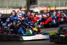 Max Verstappen racing through the field during the Max vs 100 go-kart challenge at Silverstone