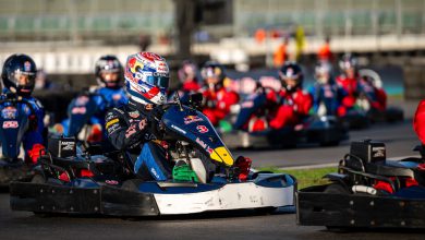 Max Verstappen racing through the field during the Max vs 100 go-kart challenge at Silverstone