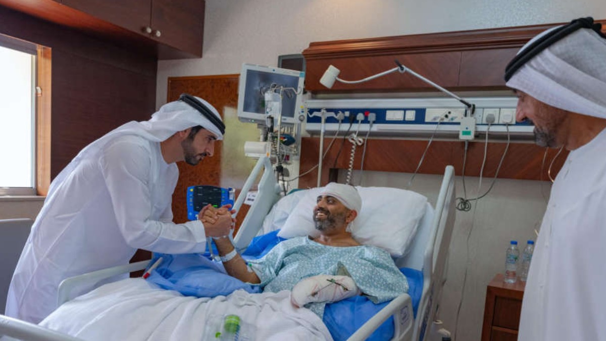 UAE Deputy PM Sheikh Hamdan bin Mohammed visiting flydubai pilot Captain Smit Machchhar in hospital